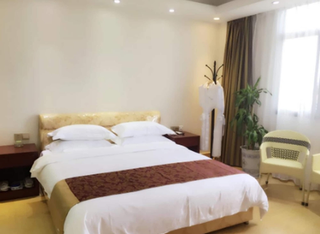 Imagen de la habitación del Hotel Jian Guo Grand. Foto 7