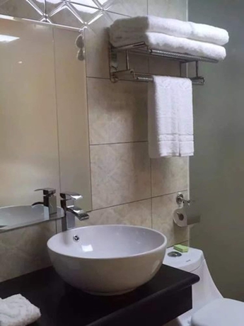 Imagen de la habitación del Hotel Jian Guo Grand. Foto 9