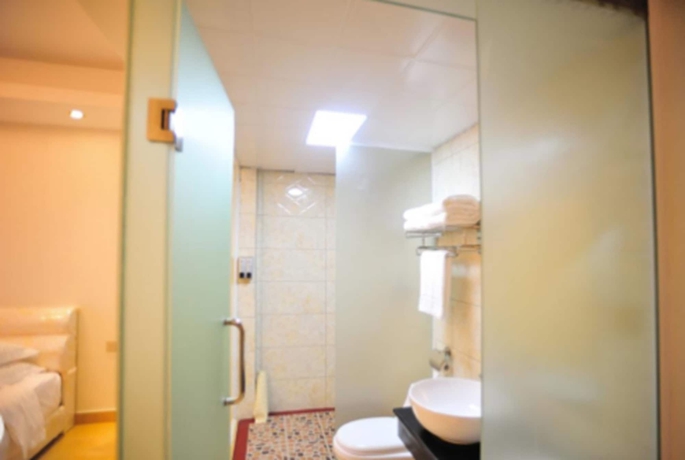 Imagen de la habitación del Hotel Jian Guo Grand. Foto 10