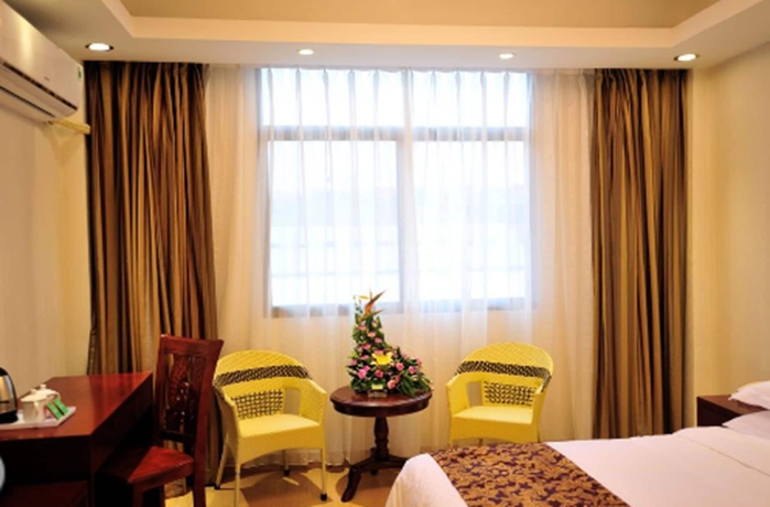 Imagen de la habitación del Hotel Jian Guo Grand. Foto 11