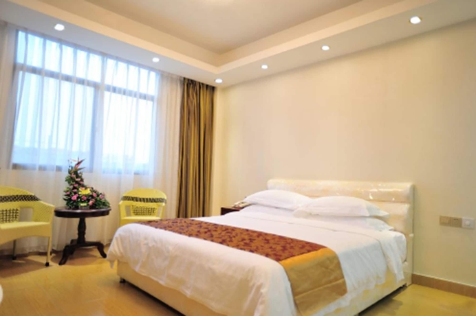 Imagen de la habitación del Hotel Jian Guo Grand. Foto 13