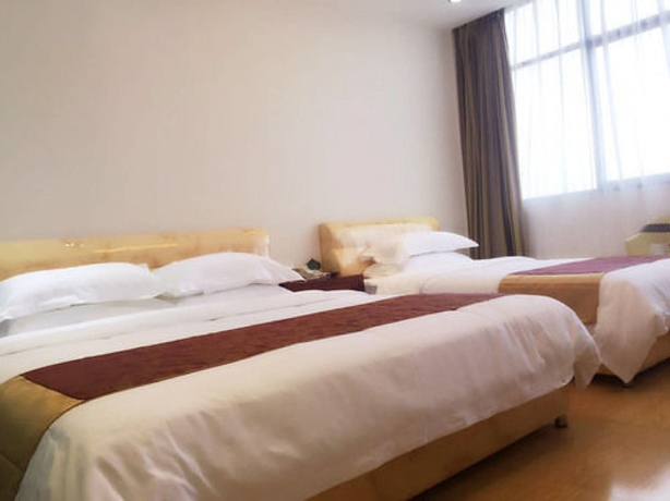 Imagen de la habitación del Hotel Jian Guo Grand. Foto 14