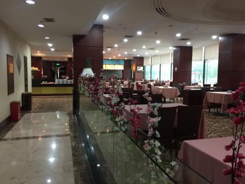 Imagen de la habitación del Hotel Jian Zhongjian Caifu International. Foto 10