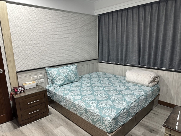 Imagen de la habitación del Hotel JianGuo. Foto 1