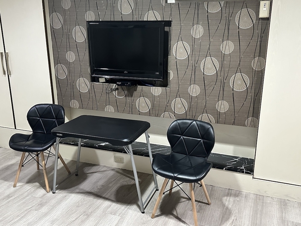 Imagen de la habitación del Hotel JianGuo. Foto 4