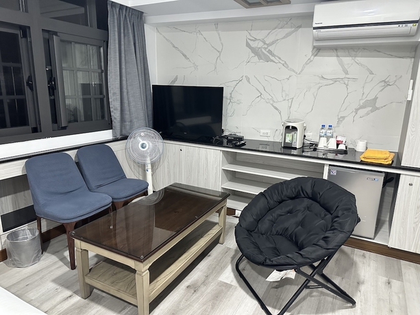 Imagen de la habitación del Hotel JianGuo. Foto 9