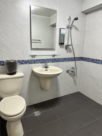 Imagen de la habitación del Hotel JianGuo. Foto 15