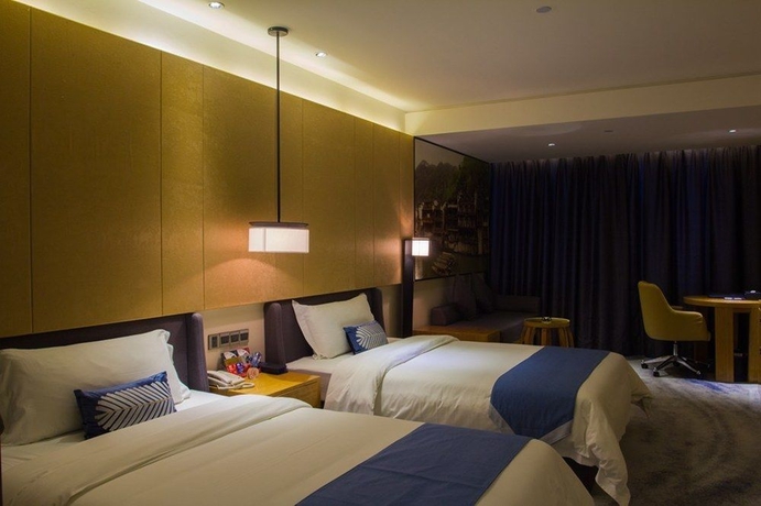 Imagen de la habitación del Hotel Jiang He. Foto 5