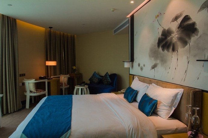 Imagen de la habitación del Hotel Jiang He. Foto 7