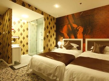 Imagen de la habitación del Hotel Jiang Tai Art. Foto 8