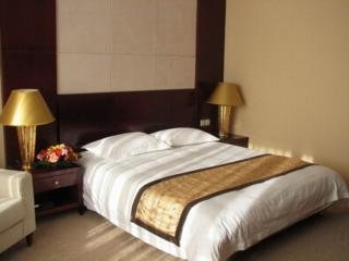 Imagen de la habitación del Hotel Jiang Xi Grand. Foto 1
