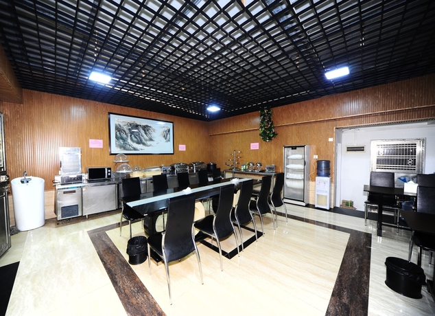 Imagen del bar/restaurante del Hotel Jiang Yue Ming Shang Hotel. Foto 4