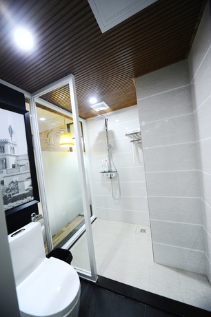 Imagen de la habitación del Hotel Jiang Yue Ming Shang Hotel. Foto 18
