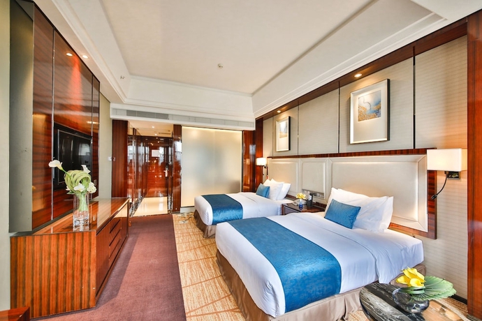 Imagen de la habitación del Hotel Jianghai Country Garden Phoenix. Foto 8