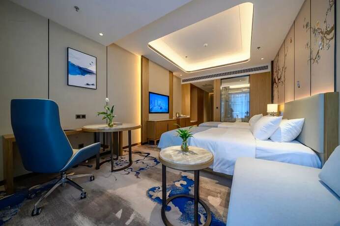 Imagen de la habitación del Hotel Jiangheyujing. Foto 11