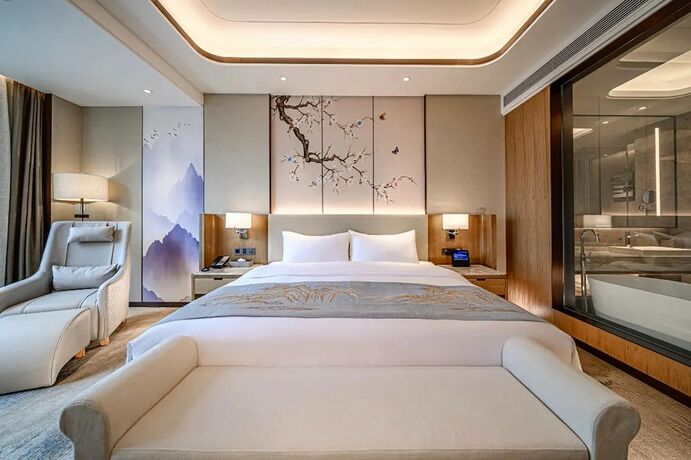 Imagen de la habitación del Hotel Jiangheyujing. Foto 12