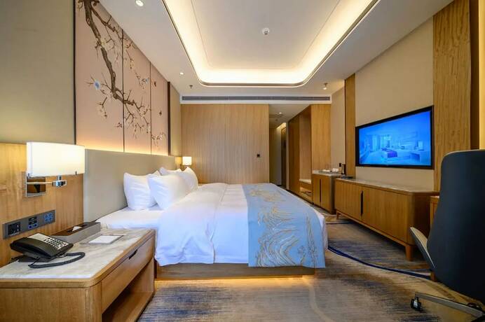Imagen de la habitación del Hotel Jiangheyujing. Foto 14