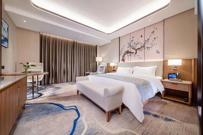 Imagen de la habitación del Hotel Jiangheyujing. Foto 18
