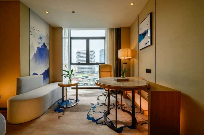 Imagen de la habitación del Hotel Jiangheyujing. Foto 19