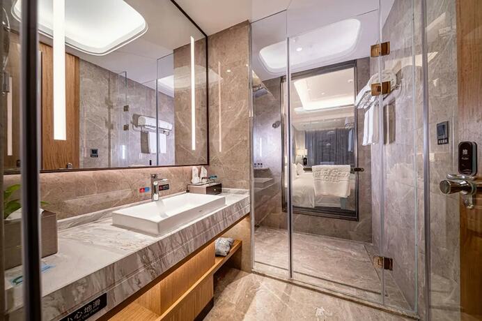 Imagen de la habitación del Hotel Jiangheyujing. Foto 20