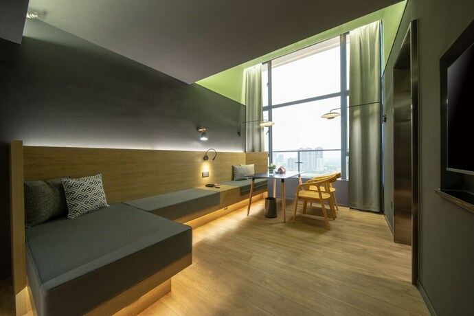 Imagen de la habitación del Hotel Jiangmen Opus. Foto 27