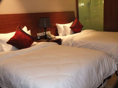 Imagen de la habitación del Hotel Jiangnan Garden. Foto 2