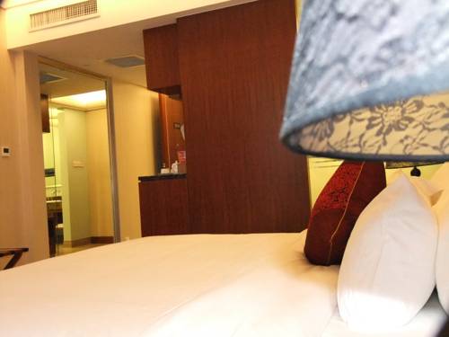 Imagen de la habitación del Hotel Jiangnan Garden. Foto 4