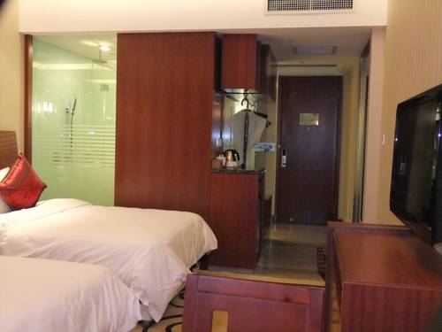 Imagen de la habitación del Hotel Jiangnan Garden. Foto 5