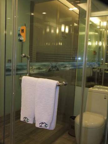 Imagen de la habitación del Hotel Jiangnan Garden. Foto 6