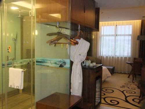 Imagen de la habitación del Hotel Jiangnan Garden. Foto 7