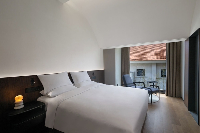 Imagen de la habitación del Hotel Jiangnan House Yangcheng Lake. Foto 8