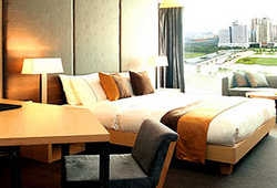 Imagen de la habitación del Hotel Jianguo. Foto 6