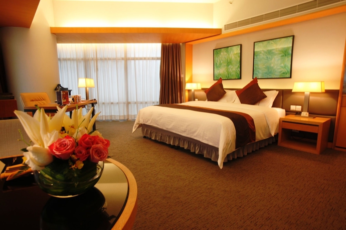 Imagen de la habitación del Hotel Jianguo Guangzhou. Foto 5