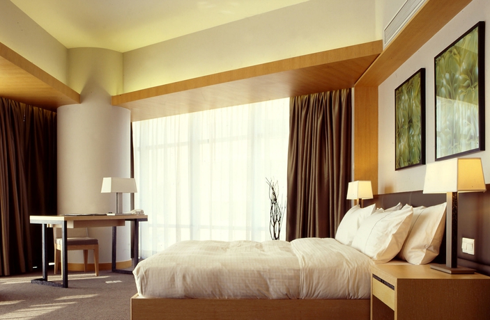 Imagen de la habitación del Hotel Jianguo Guangzhou. Foto 7