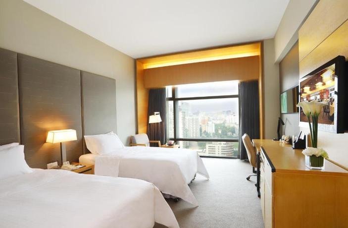 Imagen de la habitación del Hotel Jianguo Guangzhou. Foto 15