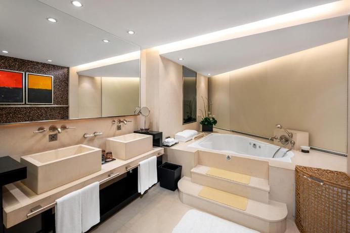 Imagen de la habitación del Hotel Jianguo Guangzhou. Foto 16