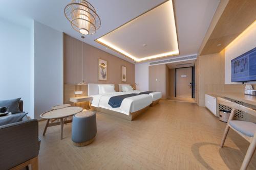 Imagen de la habitación del Hotel Jianguo Hidden Shijiazhuang Zhengding Ancient City. Foto 14