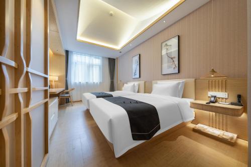 Imagen de la habitación del Hotel Jianguo Hidden Shijiazhuang Zhengding Ancient City. Foto 19