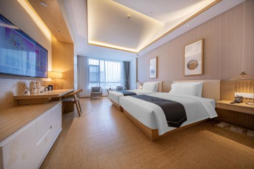 Imagen de la habitación del Hotel Jianguo Hidden Shijiazhuang Zhengding Ancient City. Foto 20