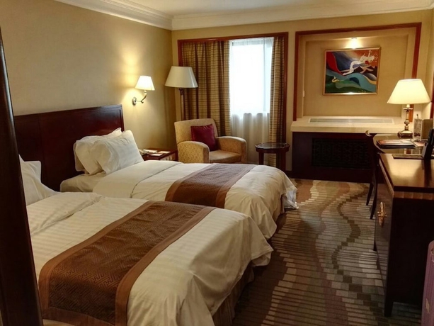Imagen de la habitación del Hotel Jianguo Hotel Beijing. Foto 11