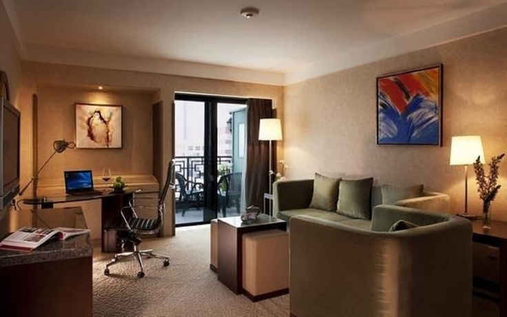 Imagen de la habitación del Hotel Jianguo Hotel Beijing. Foto 14