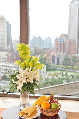 Imagen de la habitación del Hotel Jianguo Shanghai. Foto 8