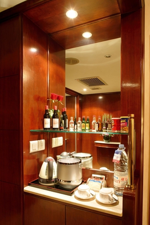 Imagen de la habitación del Hotel Jianguo Shanghai. Foto 9