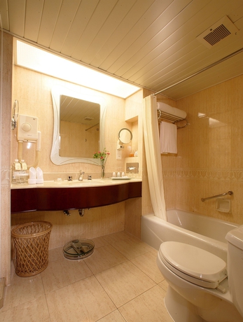 Imagen de la habitación del Hotel Jianguo Shanghai. Foto 11