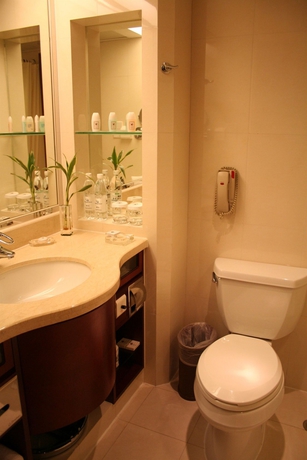 Imagen de la habitación del Hotel Jianguo Shanghai. Foto 12