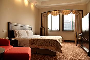 Imagen de la habitación del Hotel Jiangxi. Foto 3