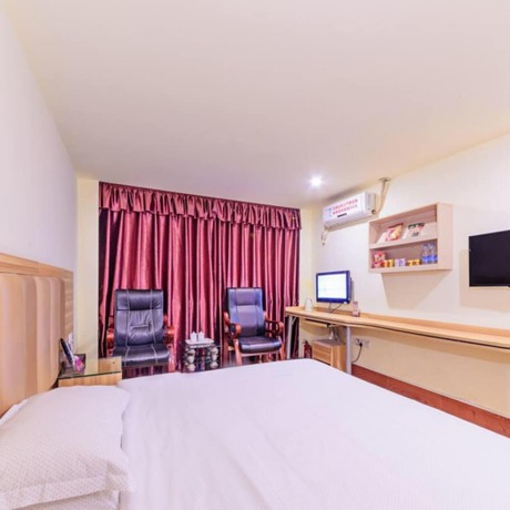 Imagen de la habitación del Hotel Jiangxia Business. Foto 14