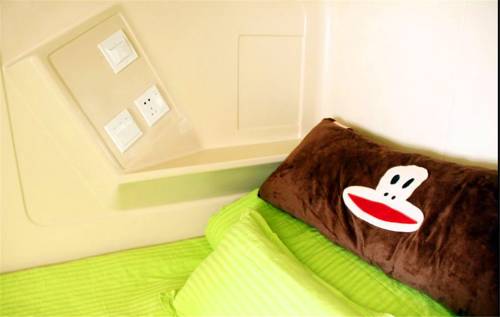 Imagen de la habitación del Hotel Jianjia Capsule Weihai. Foto 1