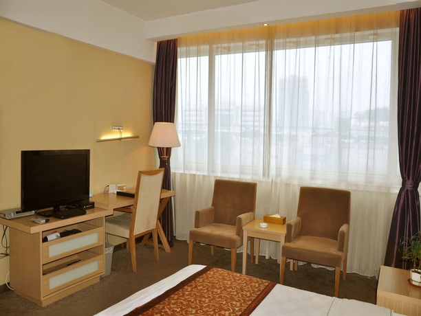 Imagen de la habitación del Hotel Jianli Harmony. Foto 1