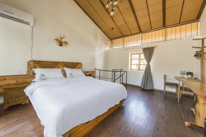 Imagen de la habitación del Hotel Jiannanshan Garden Homestay. Foto 15